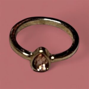Elegant Gold Ring with Teardrop Gemstone